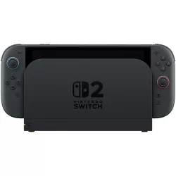 Vue de face de la console Nintendo Switch 2 installée dans son dock de salon pour le branchement sur téléviseur