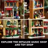 Diorama de Noel LEGO Icons 10308 avec sapin et minifigures en decoration festive